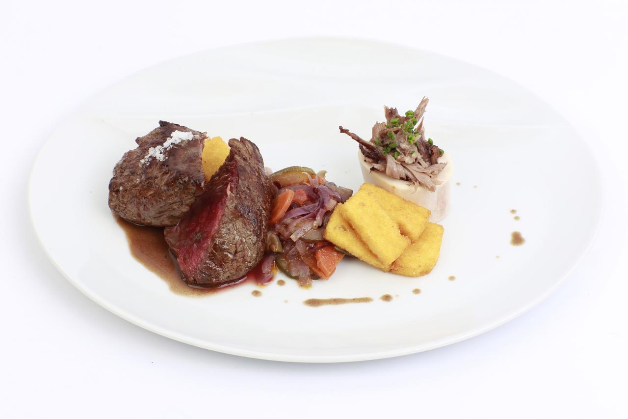 Douro Royal Valley Hotel & Spa Ribadouro Exterior photo A plate of game